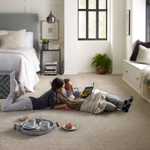 kids reading while staying on brown soft carpet from Traditional Floors in Milan, IL